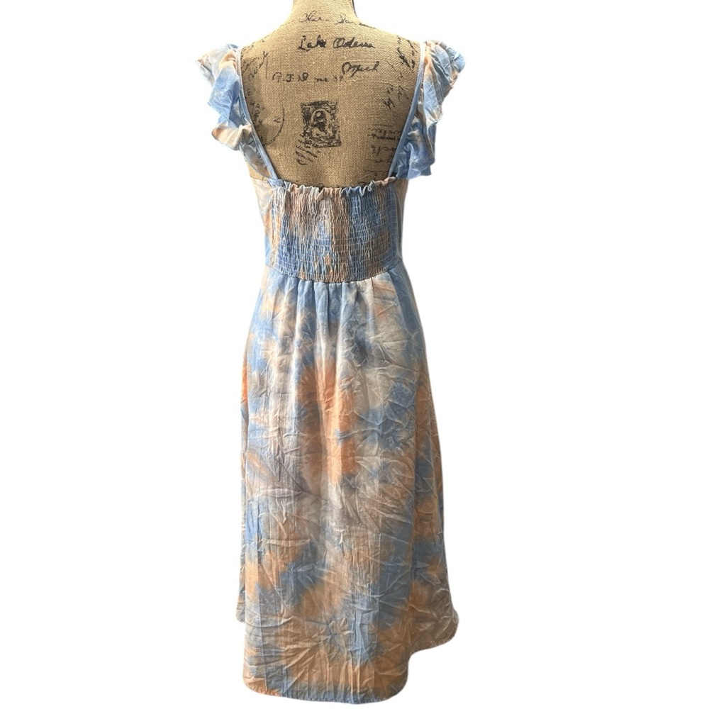 Jessy B, featuring a blue and orange tie-dye pattern dress. EC Size medium - Picture 5 of 8